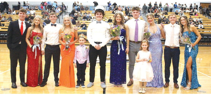ABOVE: Eisenhower High School celebrated winter homecoming last Friday, with coronation between the girls and boys varsity contests. BELOW: The candidate couples were, from left, Max Brown and Madeline Bracey, Tyler Flinkman and Karis Corenchuc, Brody Scafe and Raelyn Mruk, Carson Wright and Aubrey Pate, and Owen Wright and Hailey Weins. Travis Mounts/TSnews