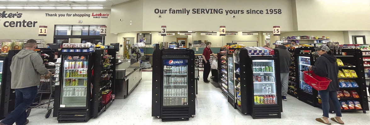 Shoppers check out at the newly re-opened Leeker’s Family Foods. The company purchased the former CashSaver, completed a week-long remodel, and opened for business last Saturday. Leeker’s built the current grocery store building in the 1990s but sold it. Leeker’s re-opening marks a return to Haysville after two decades. Travis Mounts/TSnews