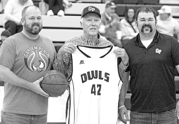 Bob Renner, center, was recognized last Friday at the Garden Plain High School homecoming games. Renner is a survivor of the Wichita State University football plane crash in 1970. Renner was a standout athlete for the Owls, and still holds the single-game scoring record for the boys basketball program. He scored 44 points against Clearwater in 1966. Also pictured are Seth Pauly, left, and Andrew Pauly. Travis Mounts/TSnews
