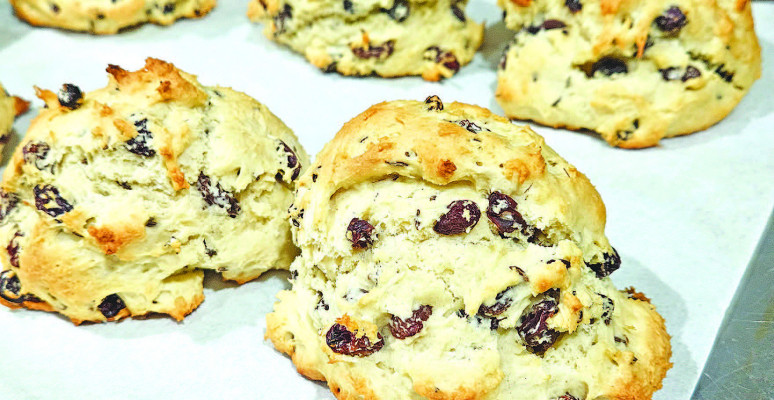 Mini Irish soda bread loaves are easy to make. They feature a crispy crust, pillowy insides and a combo of sweetness from raisins and a light peppery flavor from caraway seeds.