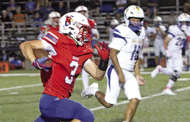 Cheney’s Sam Johnson outruns a Collegiate defender during last Friday’s home victory. Travis Mounts/TSnews