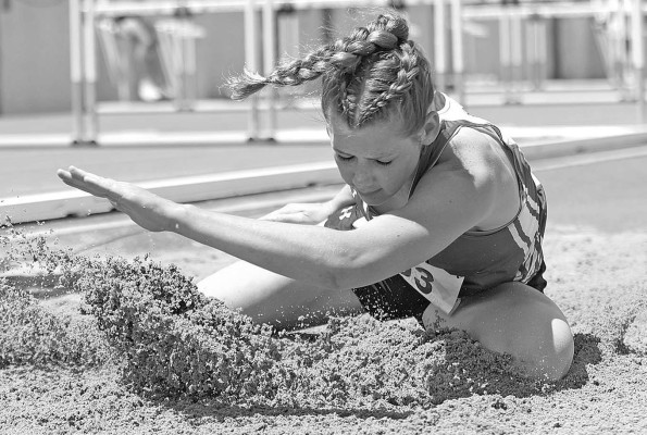 Lairen Pauly sticks the landing during one of her attempts in the Class 3A triple jump. She had Conway Springs’ best finish, placing fifth. Stephanie McKennon/TSnews