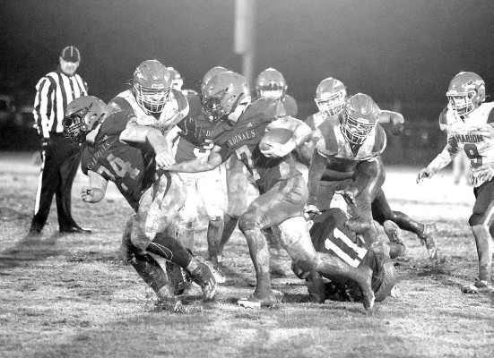 Isaac Winter follows the block of Cade Howell for a big gain during the Conway Springs’ Cardinals home playoff victory against the Marion Warriors. The Cardinals, who are ranked No. 1 in Class 1A and seeded No. 1 in 1A West, will host Plainville this Friday. Stephanie McKennon/TSnews