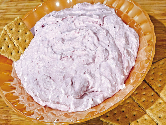 For those in need of a quick and easy dish for the snack table this holiday season, this cranberry cream cheese dip is a fabulous addition for your guests.