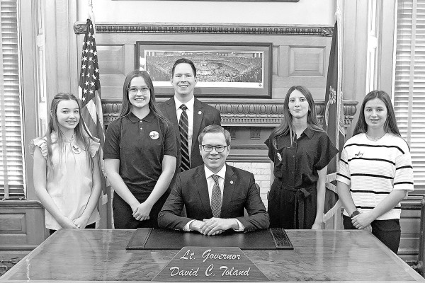 Four local students served as pages for State Sen. Chase Blasi of District 26 on March 13. Pictured from left are: Savannah Scheer from St. Elizabeth Ann Seton Catholic School, Laney Moses from Eisenhower High School, Blasi, Lt. Gov. David C. Toland, Lillie Smith from Cheney High School, and Blair Porter from St. Marks Middle School. Contributed photo