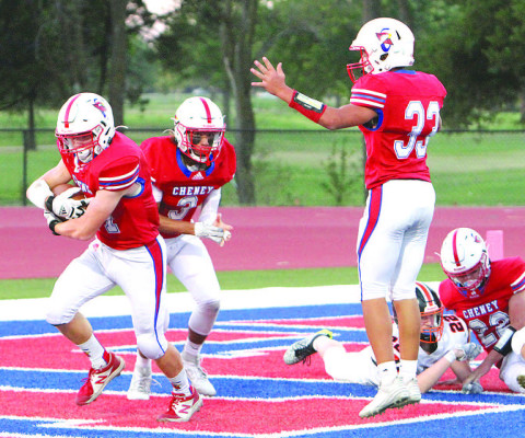 Cheney’s Levi Self, left, scores a special teams touchdown in Friday’s win. He recovered a bad snap by Smoky Valley to give the Cardinals a 14-0 lead. Travis Mounts/TSnews