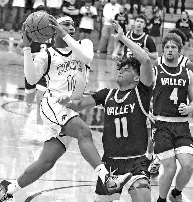 Ja’Myias Caldwell of Campus drives the lane during Friday’s homecoming win against Valley Center. He scored 17 points, one of his best games of the season. Stephanie McKennon/ TSnews