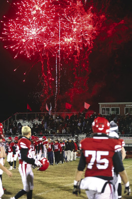 The Conway Springs Cardinals watch as fireworks go off after their impressive win over Valley Heights last Friday. They will play for their ninth State championship on Saturday. Stephanie McKennon/TSnews