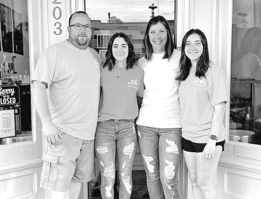 The Kennard family pictured in front of The Daily Scoop. The downtown Conway Springs business will be closing on Dec. 27. Contributed photo