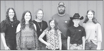 The Wells family is one of Kansas Farm Bureau’s 2024 Farm Families of the Year. The Wells family is pictured on their farm in Sedgwick County. Contributed photo