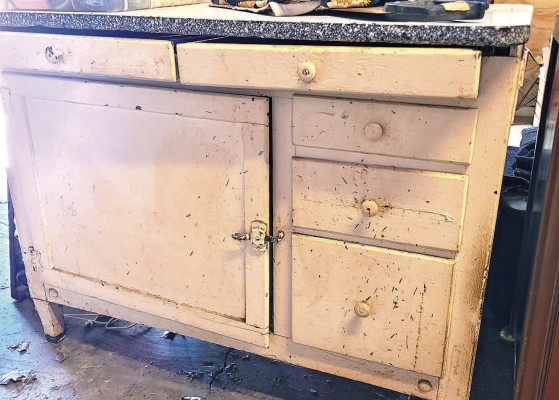 Before their warehouse sale, Paul Rhodes and Kim Swansen had a rough Hoosier base cabinet that needed a new home. Paul Rhodes/TSnews