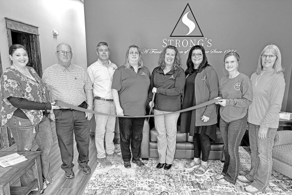 Strong’s Insurance, Inc., held a ribbon-cutting and open house last Friday afternoon for their new location in Cheney. The company has relocated to 104 N. Main, just a block away from its former location at at 209 N. Main. The Kingmanbased company also has locations in Anthony, Pratt, Medicine Lodge and Maize. Contributed photo