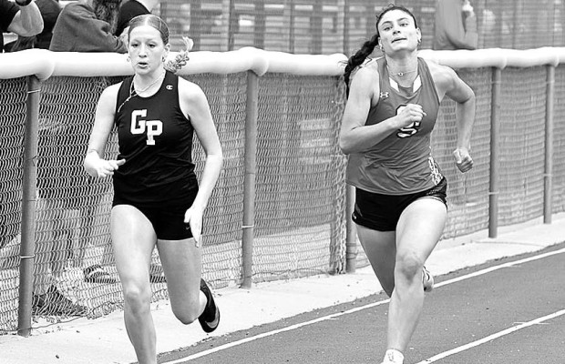 Garden Plain’s Reagan Stahlheber, left, and Conway Springs’ Delaney Jones compete in a heat of the 100 meters at the Wayne Pipkin Invitational. The meet meet took place Friday in Garden Plain. Turn to Page B4 for track results. John Bloomquist/Contributed photo