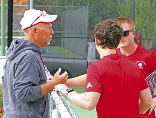 Conway Springs tennis coach Chris Bellar offers some advice to one of his doubles teams during a 2023 home tournament. Bellar was named the All-Class High School Tennis Coach of the Year by the Kansas Tennis Coaches Association. Travis Mounts/TSnews