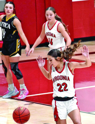 Argonia’s Bailey Haines eyes a loose ball during the Raiders’ win over rival Attica, which was ranked in preseason polls. Savannah Shively/ USD 359