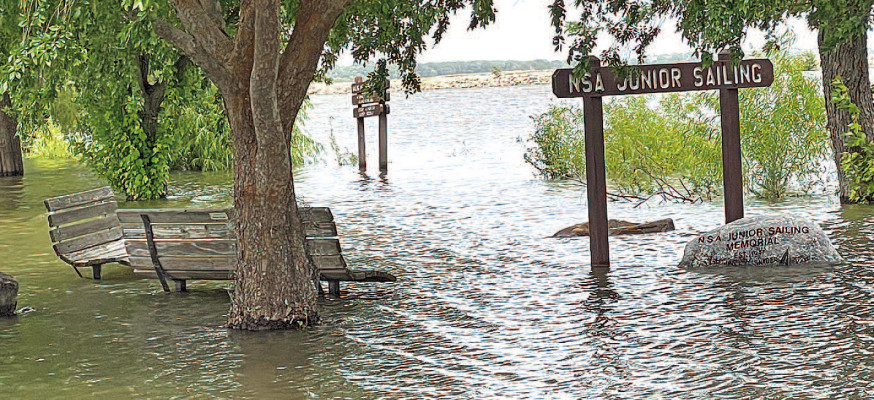Water covers portions of normally-dry ground at the Ninnescah Sailing Club, located at Cheney State Park. Flooding impacted much of the park in recent weeks. Travis Mounts/TSnews