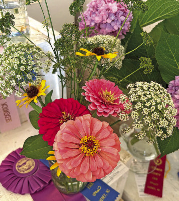 Lisa Snell of Wichita entered a floral bouquet into the Open Class Competition at the Sedgwick County Fair and won grand champion. The bouquet included zinnias, carrot flowers, black-eyed susans and parsley flowers. Brianna Barnes/TSnews