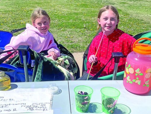Spring is here and summer is coming when lemonade stands start popping up. Makynlee Cox, left, and Oaklynn Lutz were out on Main Street in Cheney last Friday and Saturday, selling drinks and snacks. This summer, share your lemonade stands with TSnews; email photos to news@tsnews.com. Be sure to include names and city. The paper will share as many photos as possible. Travis Mounts/TSnews