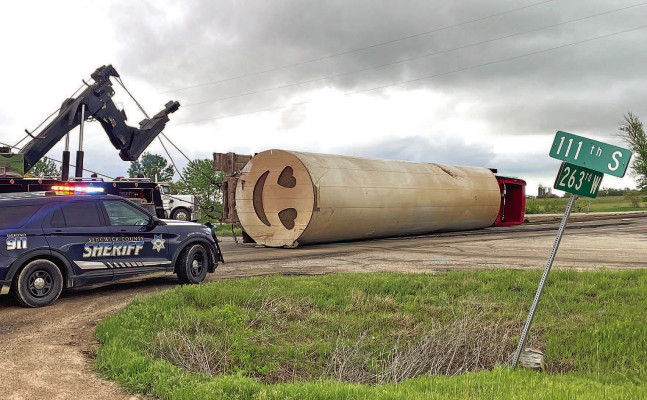 A tractor-trailer lays on its side on 263rd Street West on April 30, where the road intersects with K-42 Highway and with 111th Street South. A collision with another semi truck closed the intersection for hours. The day before, a crash involving non-commercial vehicles also closed the intersection. Travis Mounts’TSnews