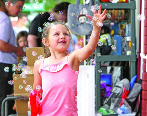 The annual Argonia Days celebration took place last Saturday, blessed by good weather. Autumn Hicks of Harper enjoyed the day playing with her bubble sword. The day included inflatables, a corn hole tournament, a kiddie tractor pull, a street splash with the Argonia Volunteer Fire Department, and more.