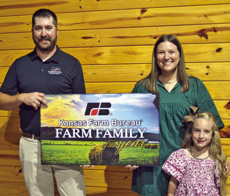 Ashton Schneider and her daughter, Greta, were named as the Sedgwick County Farm Bureau Farm Family of the Year at the orgnaization’s annual meeting, held near Clearwater. Dale Stelz/TSnews