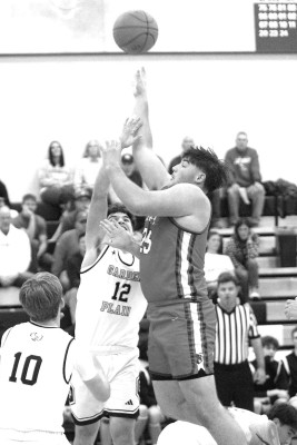 Garden Plain’s Eli Eck tries to block the shot of Cheney’s Ayden Koehn in last Friday’s game. Travis Mounts/TSnews