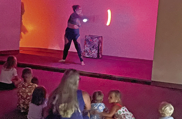 Performers from Fire Phlox gave an indoor-friendly performance with lights on July 29 at the Haysville Community Library. The performance was part of the summer reading program. Fire Phlox is generally known for its outdoor performances featuring various flaming torches. Travis Mounts/TSnews