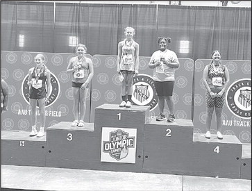 Autry Young stands at the top of the podium after winning All-American at the AAU Junior Olympics in Iowa. Contributed photo