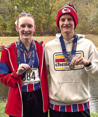 Abigail Blundell, left, and Stratton Young both medaled at the Classs 3A State cross country meet. Contributed photo