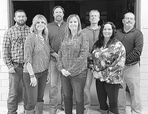 Back row, from left: Shawn White, Shane Morrison, Scott Jones, and Brian Fitch. Front row, from left: Sarah Vineyard, Melinda McCurley, Tiffani Callaway