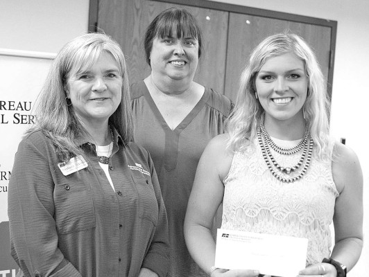 4-H alumnus Sammie Strnad, pictured at right, was named as the dessert winner at this year’s Sumner County Farm Bureau banquet and annual meeting, which was held at the Raymond Frye Complex in Wellington. Dale Stelz/TSnews