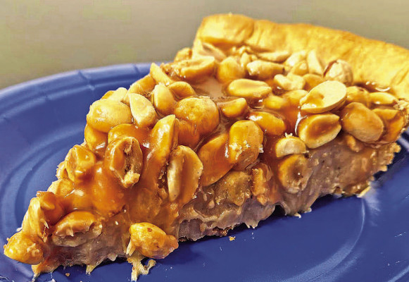 Featuring salty peanuts, along with a peanut butter and marshmallow base and homemade caramel on top, this pie, inspired by Payday candy bars, is a must for any peanut lover.