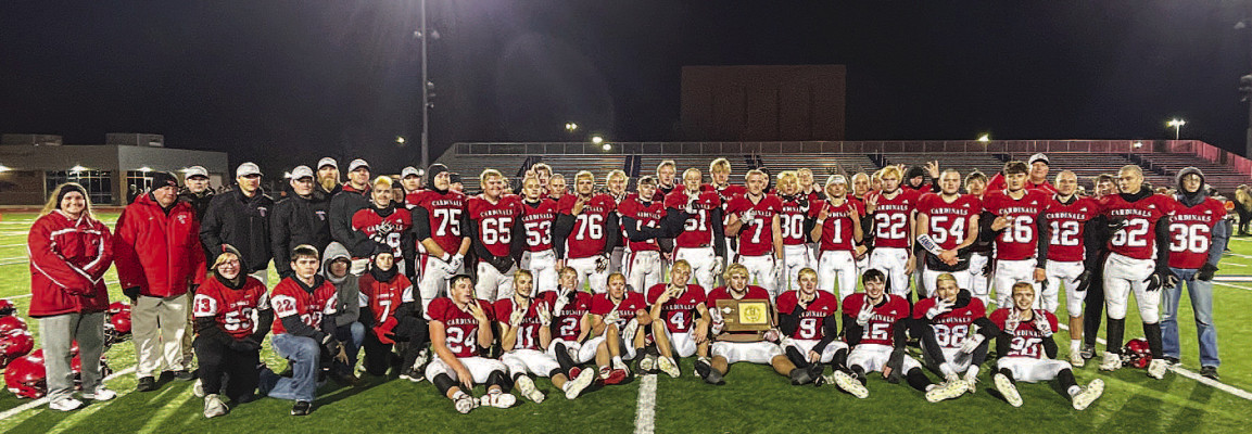 The Conway Springs Cardinals show off their 2024 State championship trophy. It is the ninth football title in school history. Stephanie McKennon/TSnews