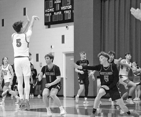 The Raiders’ Jackson Kollmeyer puts up a 3-point shot during last Friday’s homecoming game against Flinthills. Contributed photo