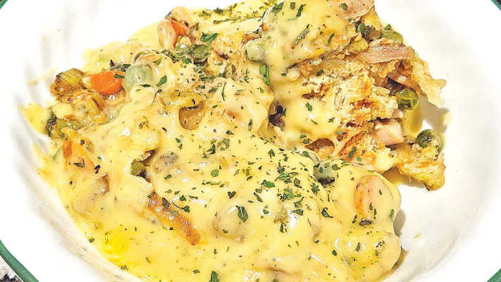 Crescent roll chicken pot pie casserole comes together quickly and features lots of great flavors from some fresh vegetables, along with plenty of herbs. It makes for a fantastic weeknight meal.