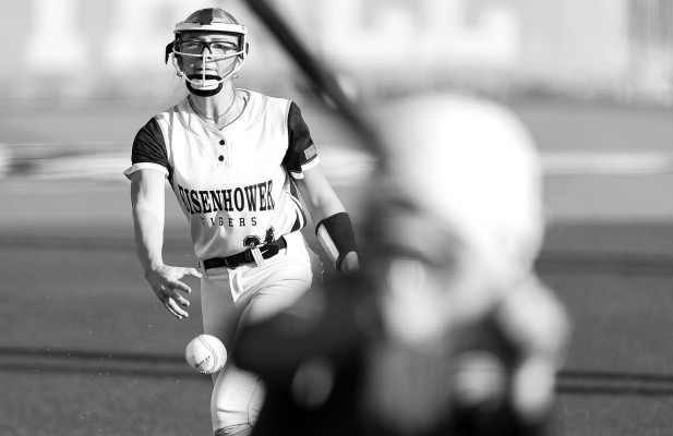 Eisenhower pitcher Adisson Quinn delivers a pitch to a Goddard batter during last week’s games. The Tigers and the Lions each won a game.