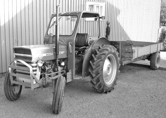 Rollover Protection Structures, like the one on this Massey Ferguson 135 tractor, can help prevent operators from suffering serious injuries and even death. Photo by K.A. Gallis