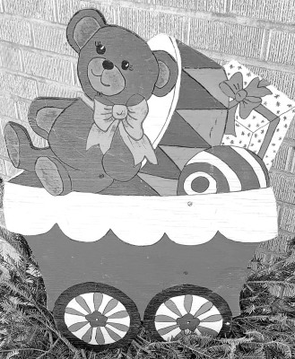 No, this isn't Mr. Snowman. No photos of the abducted Christmas decoration were available. This is the train car full of toys that will have to finish the holiday season in the Times-Sentinel Newspapers planter. Paul Rhodes/TSnews