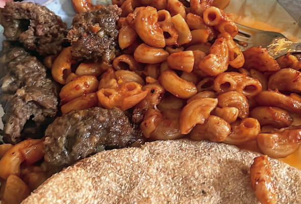 A homemade Egyptian meal consisted of a meat dish called kofta, “Egyptian pasta” made of macaroni and a tomato paste, and pita bread. Travis Mounts/TSnews