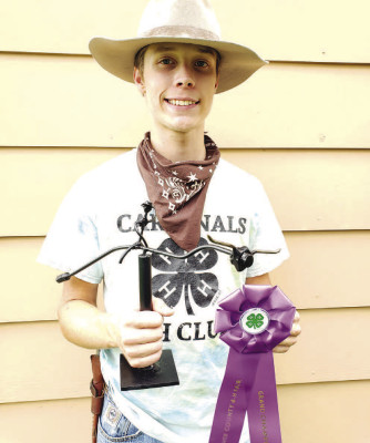 Wyatt Harlan, a member of the Cardinals 4-H Club in Conway Springs, won a grand champion award at the Sumner County 4-H Fair in July with this welded cowboy riding a bull. Contributed photo