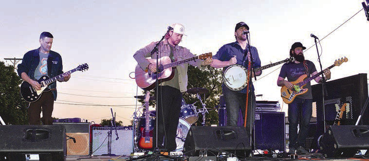 Mountain Deer Revival performs during Saturday's Garden Plain Fall Festival. This was a brand new event, and it served as a fundraiser for a gateway sign that city leaders hope to install. More fall festival pictures are available for subscribers at tsnews.com Dale Stelz/TSnews