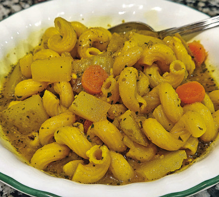 For a great low-calorie and vegan meal, vegetable noodle soup packs a ton of flavor with lots of delicious spices and fresh vegetables.