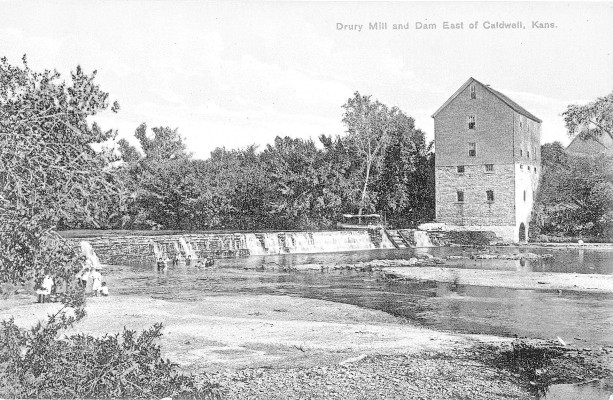 This postcard shows the Drury Mill and Drury Dam, located east of Caldwell.