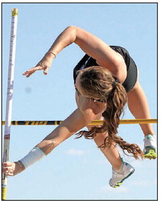 Ella Ranz of Eisenhower clears 10-0 to win the pole vault at the Tigers’ home track meet on Monday. Travis Mounts/TSnews