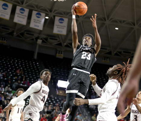 Andrell Burton, Jr., drives to the basket during the Campus Colts’ game against the Heights Falcons in the first round of the 6A State basketball tournament at Koch Arena in Wichita. Stephanie McKennon/TSnews
