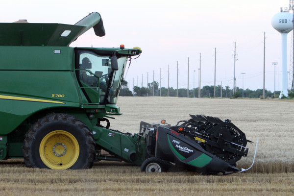 A farmer cuts wheat near Goddard at the start of the 2022 harvest. This year's harvest will start sooner rather than later unless the area receives some much-needed rain. Travis Mounts/TSnews