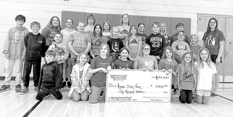 The Argonia Swim Team with head coach Kristina Greenwood, far right, has been awarded a $1,000 Wheatland Electric Sharing Success grant, which will be used to help purchase essential equipment and supplies needed to host the team's annual swim meet. Contributed photo/Wheatland Electric