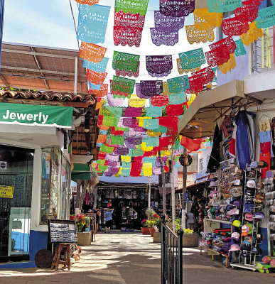 A secluded street in Puerto Vallarta was filled with beautiful Mexican banners. Photos by Paul Rhodes and Kim Swansen/TSnews