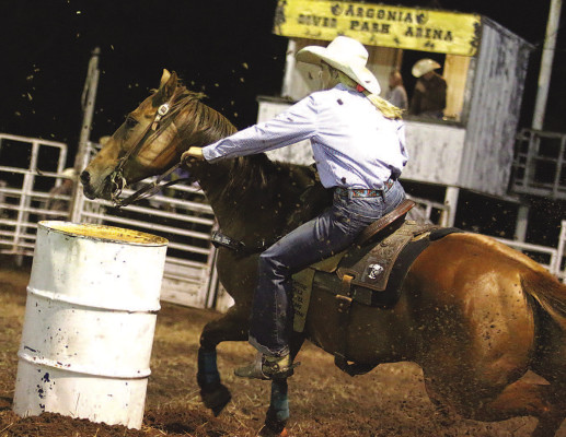 Taylor Davis cuts around a barrel during the 2020 Bronc Kraft Memorial Rodeo in Argonia. The City of Argonia is now taking bids for demolition of the arena. File photo