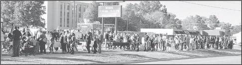 Trick-or-treaters lined both sides of Main Street at Haysville's annual Halloween event. It draws a large crowd every year, with businesses and organizations lining the street. The city also provided free hot dogs at the Vickers Station, and the band Tequila Ridge played live. Dale Stelz/TSnews